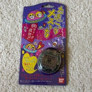 Bandai Tamagotchi Digital Pet - Clear Gray